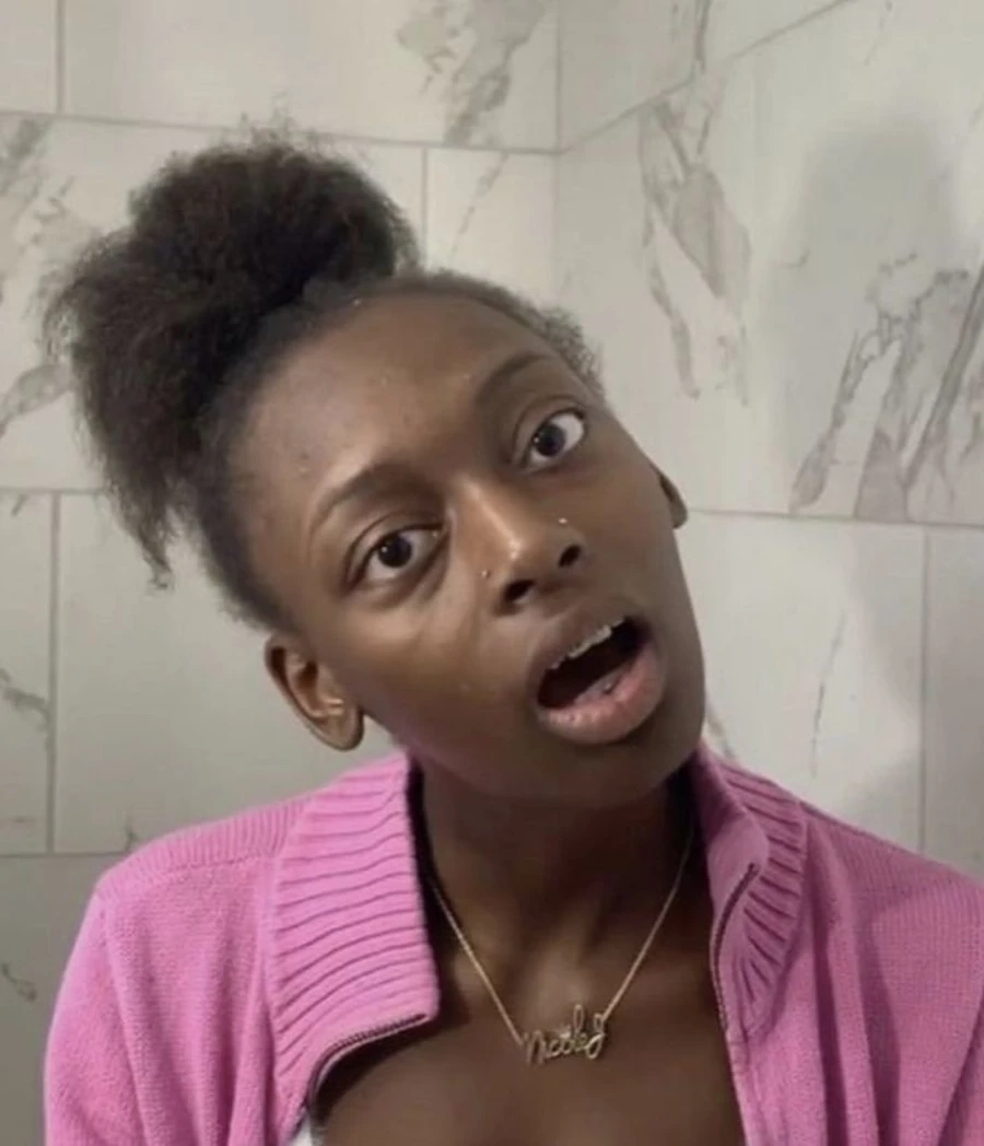 Biểu cảm meme người da đen lườm thể hiện sự khó chịu hài hước